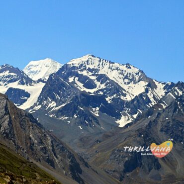 The natural ॐ (Om) symbol formed by snow on the face of Om Parvat.