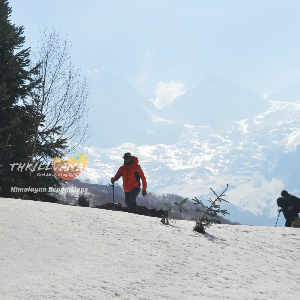 Trekkers in the snowy foothills of the Darma Valley on the Thrillvana Panchachuli Base Camp route.
