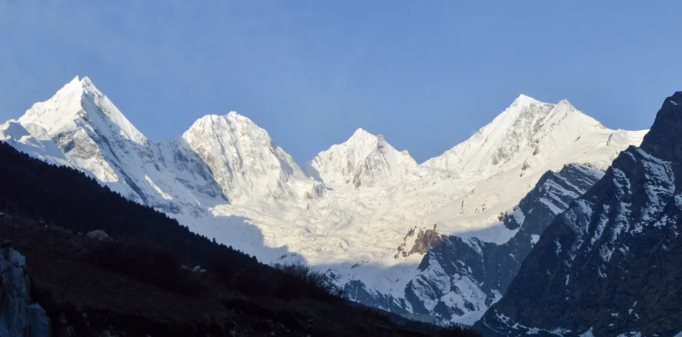 Panchachuli Base Camp Trek - The majestic five snow-capped peaks of Panchachuli in Darma Valley, Uttarakhand, captured during a ThrillVana expedition.